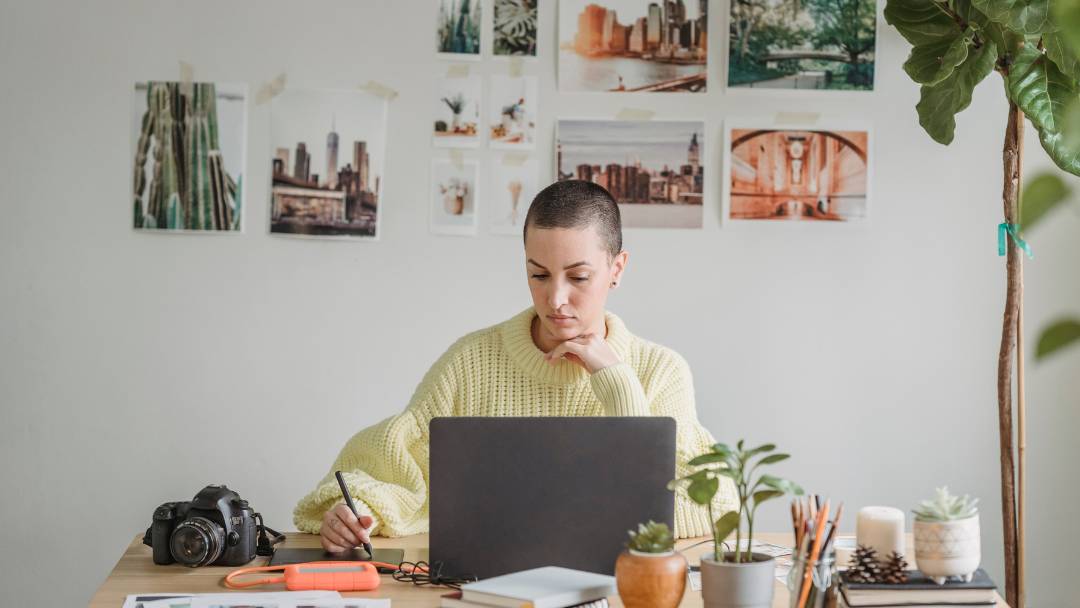 The Importance of Taking out Key Person Cover. Female business woman working at home from at her laptop.